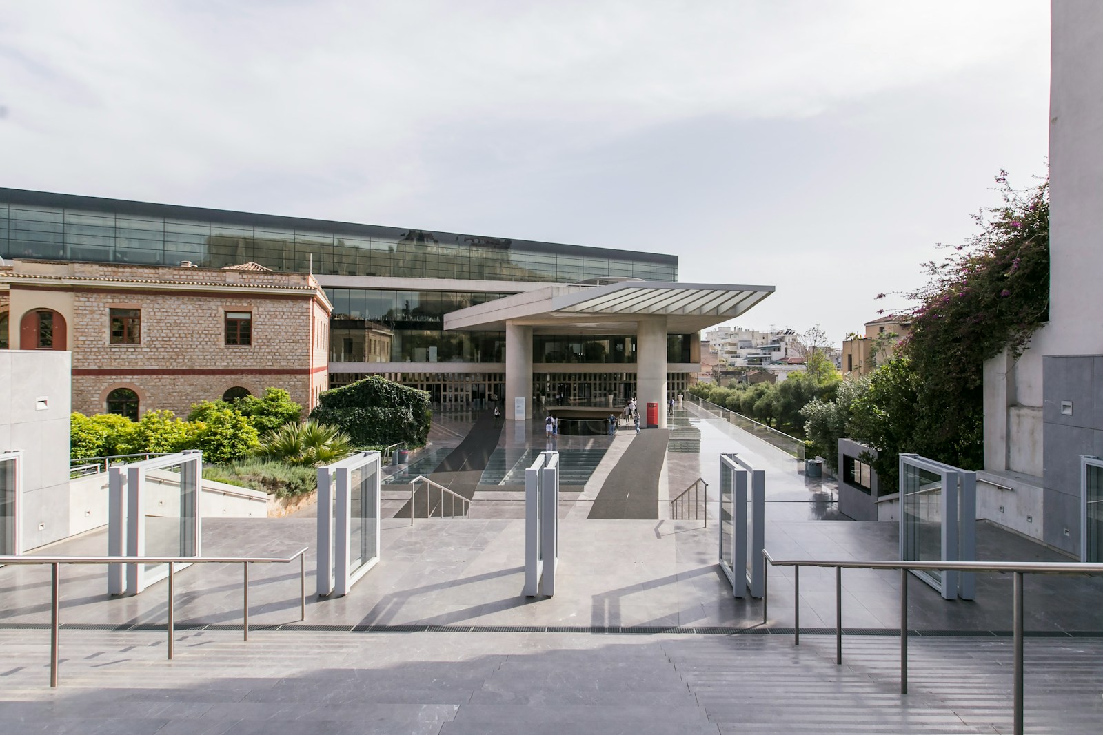 The Acropolis Museum, a glass building with the Parthenon reflected in its facade